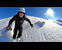 Backcountry ski touring with your dog in powder after a Retour d'Est